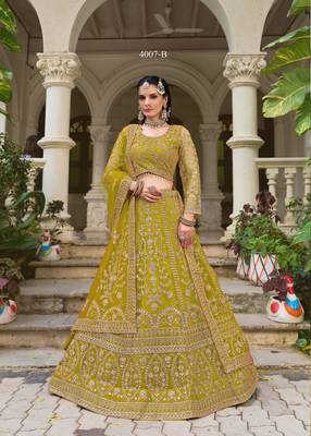 bridal wear yellow net lehenga choli embroidery stone work 1