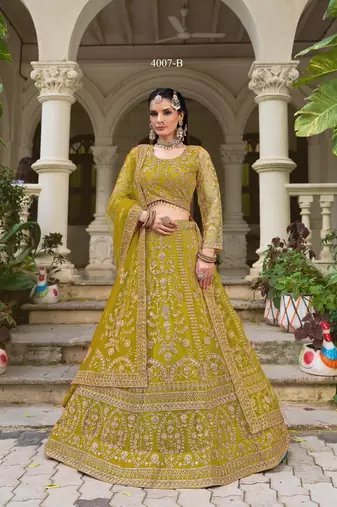Indian wedding bridal wear yellow net lehenga choli semi stitched embroidery stone work