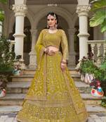 bridal wear yellow net lehenga choli embroidery stone work