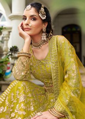 bridal wear yellow net lehenga choli embroidery stone work 3