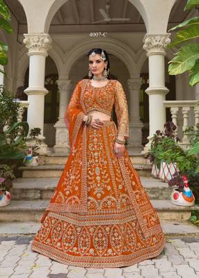 bridal wear orange net lehenga choli embroidery stone work 1