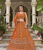 bridal wear orange net lehenga choli embroidery stone work