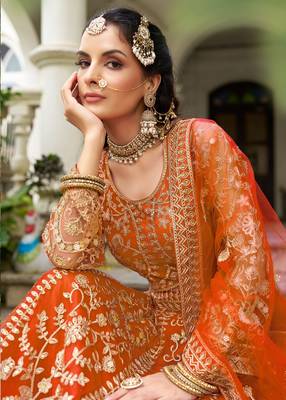 bridal wear orange net lehenga choli embroidery stone work 2