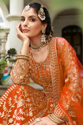 bridal wear orange net lehenga choli embroidery stone work