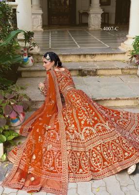 bridal wear orange net lehenga choli embroidery stone work 3