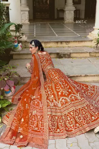 bridal wear orange net lehenga choli embroidery stone work