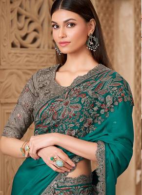 Teal color satin silk blend embroidered border saree 3