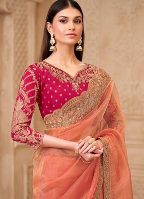 Peach color georgette silk blend embroidered border saree 2