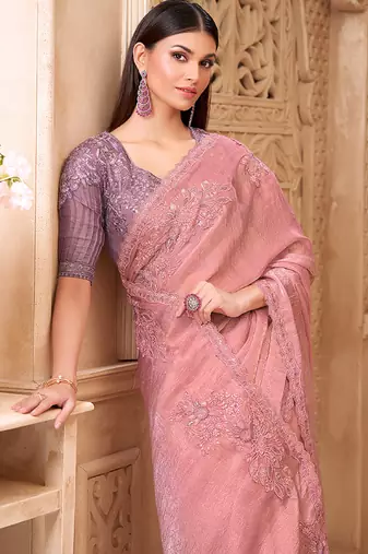 Pink color crush satin georgette embroidered border saree