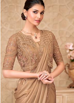Beige shimmer satin georgette embroidered border saree with jacket style blouse 2