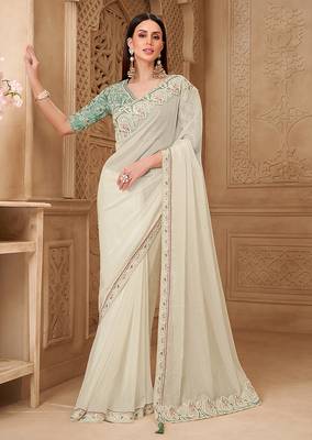 Off white color georgette silk blend embroidered border saree 1