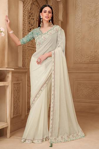 Off white color georgette silk embroidered border fancy designer saree