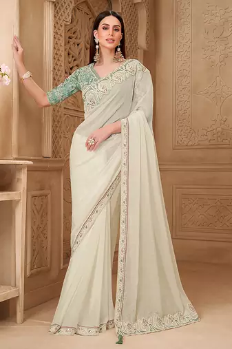 Off white color georgette silk embroidered border fancy designer saree