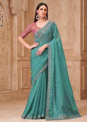 Turquoise color crush satin georgette embroidered saree 1