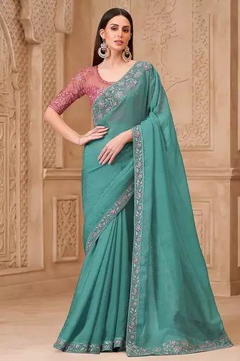 Turquoise color crush satin georgette embroidered fancy designer saree