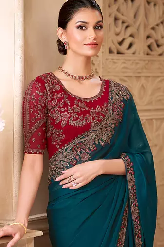 Dark teal color satin georgette  embroidered saree