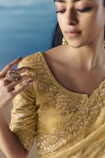 Yellow fancy fabric with embroidery sequince work saree