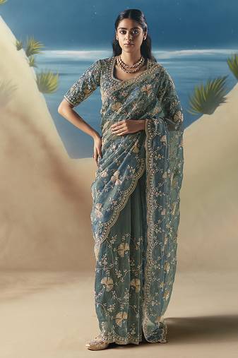 Teal blue fancy fabric with designer embroidery sequince work saree
