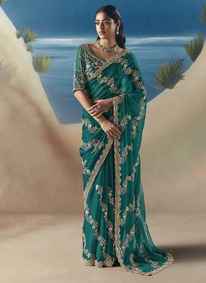 Teal fancy fabric with embroidery sequince work saree 1