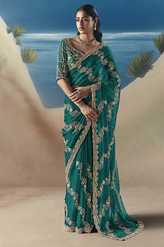 Teal fancy fabric with designer embroidery sequince work saree
