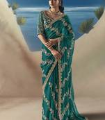 Teal fancy fabric with designer embroidery sequince work saree