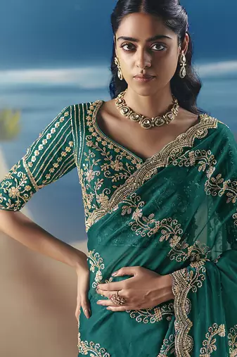 Teal fancy fabric with embroidery sequince work saree