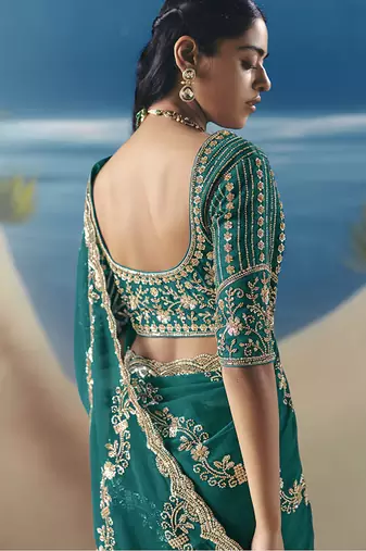 Teal fancy fabric with embroidery sequince work saree