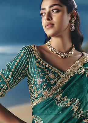 Teal fancy fabric with embroidery sequince work saree 4