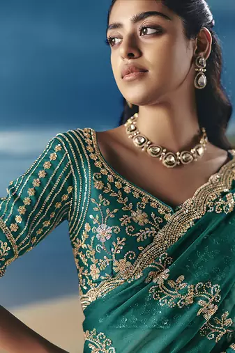 Teal fancy fabric with embroidery sequince work saree