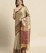 Beige woven banarasi silk saree with blouse