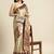 Beige woven banarasi silk saree with blouse