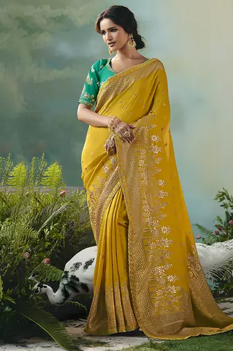 Yellow dola viscose silk saree with zari weaving & sequence work blouse