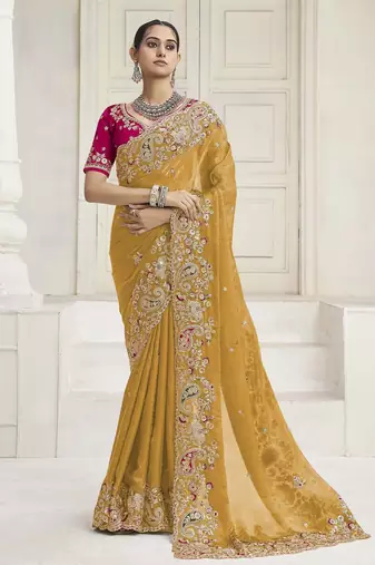 Yellow party wear fendi saree with designer blouse fabric