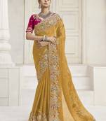 Yellow party wear fendi saree with designer blouse fabric