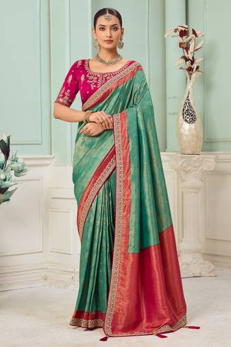 Rama party wear jecquard saree with designer blouse fabric