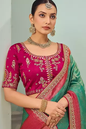 Rama party wear jecquard saree with designer blouse fabric