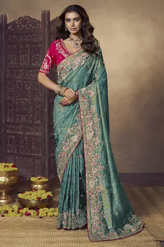 Rama party wear jecquard saree with designer blouse fabric