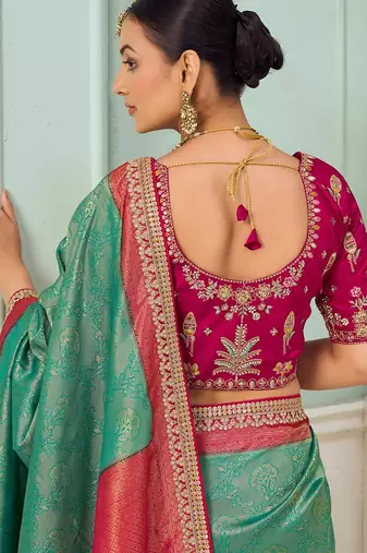 Rama party wear jecquard saree with designer blouse fabric