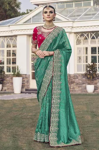 Rama party wear jecquard saree with designer blouse fabric