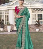 Rama party wear jecquard saree with designer blouse fabric