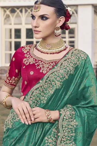 Rama party wear jecquard saree with designer blouse fabric