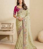 Green party wear tissue saree with designer blouse fabric