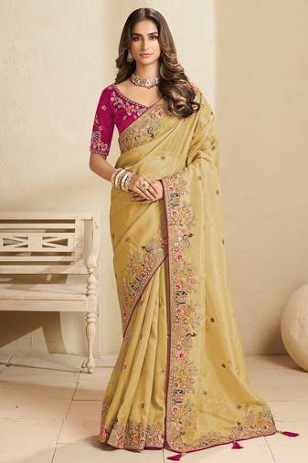 Gold party wear tissue saree with designer blouse fabric