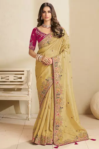 Gold party wear tissue saree with designer blouse fabric