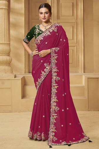 Rani pink party wear fancy silk saree with designer blouse fabric