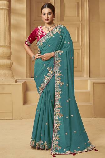 Green party wear fancy silk saree with designer blouse fabric