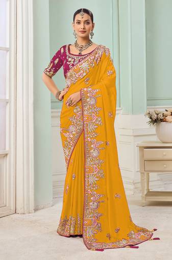 Yellow party wear satin saree with designer blouse fabric