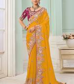 Yellow party wear satin saree with designer blouse fabric