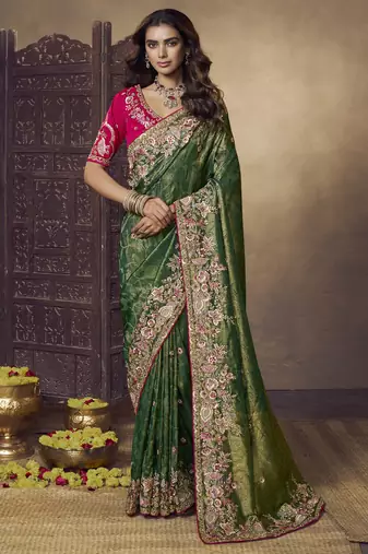 Green party wear jecquard saree with designer blouse fabric