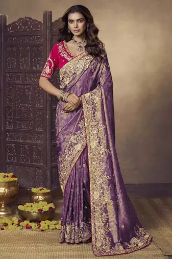 Purple party wear jecquard saree with designer blouse fabric